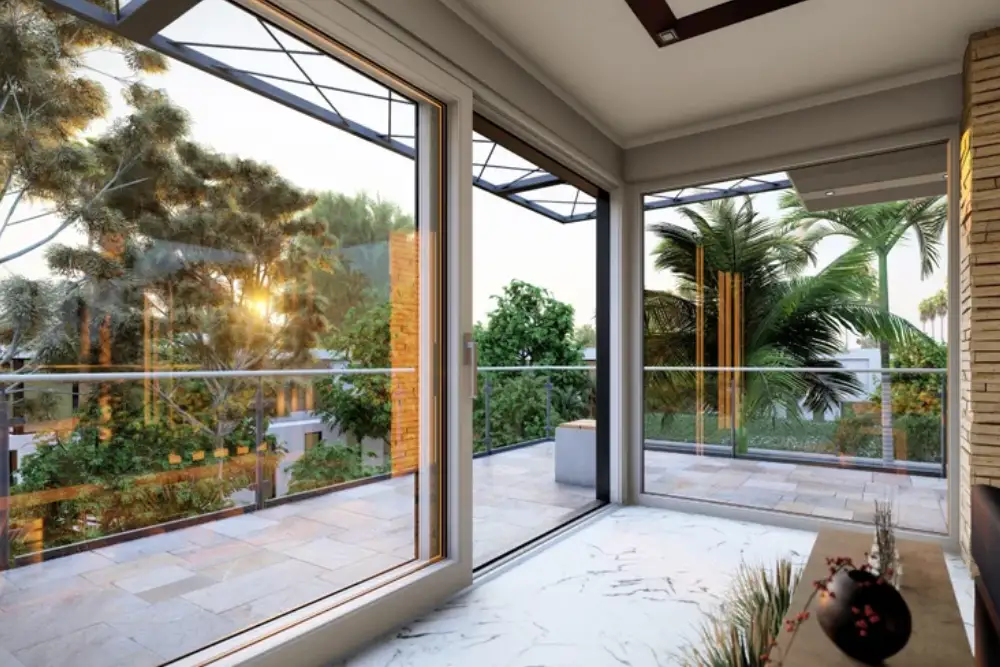 grande baie coulissante aluminium profiles fins vue sur terrasse et jardin