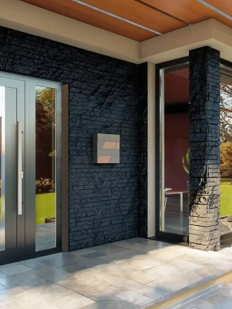 porte d entree aluminium gris avec baie vitree sur facade pierre noire