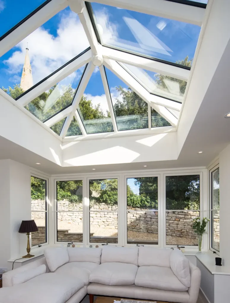 veranda blanche avec toiture vitree